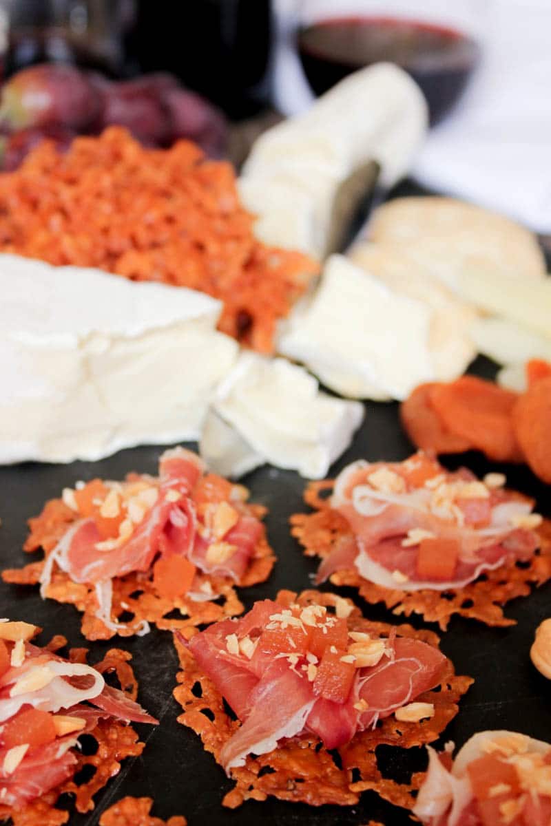 Manchengo-crisps-with-serrano-ham-quince-paste-and-marcona-almonds-4