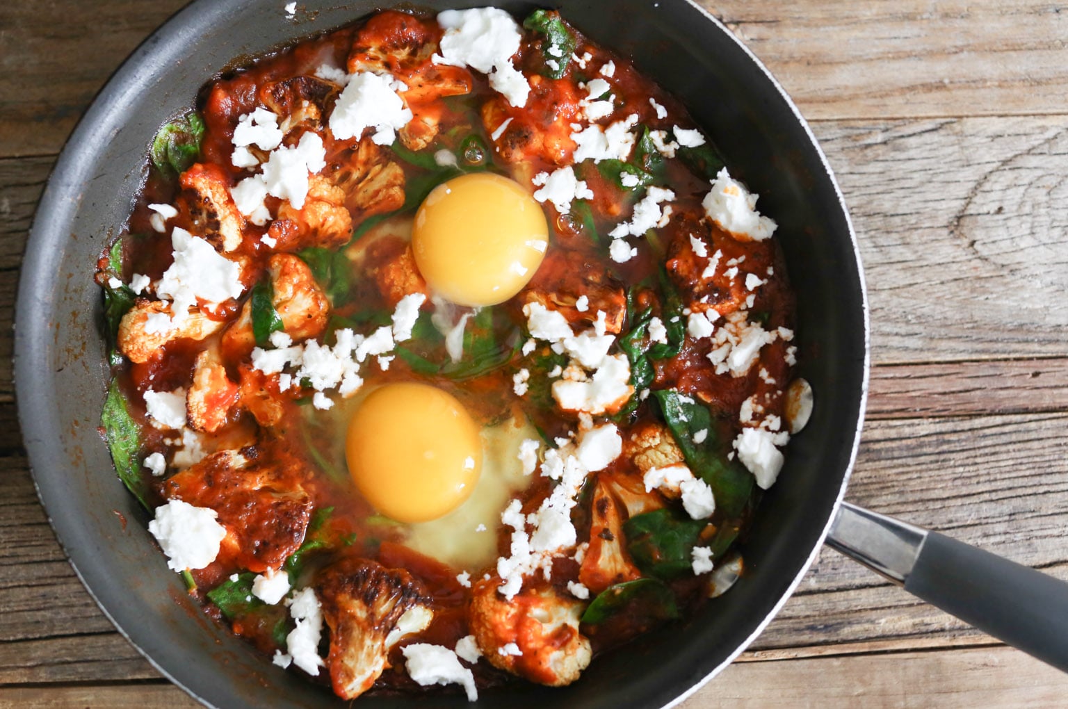 5-ingredient Skillet Eggs with Spinach and Roasted Cauliflower