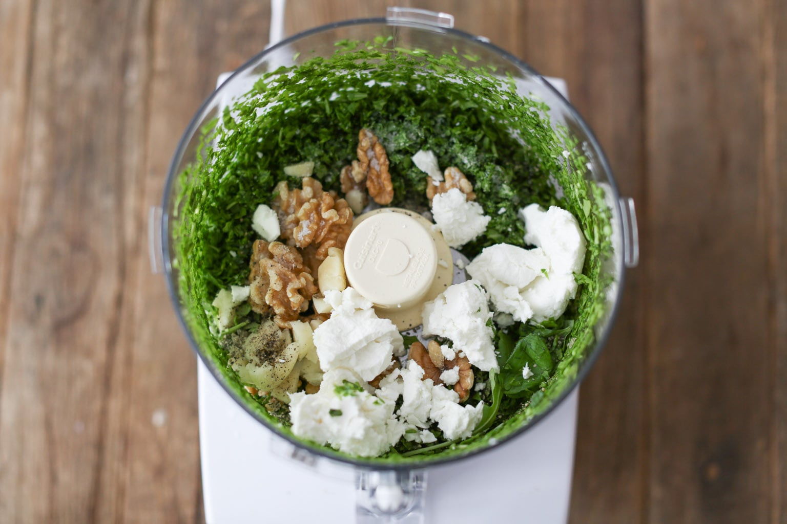 Sausage and Sun-Dried Tomato Pasta with Arugula-Goat Cheese Pesto