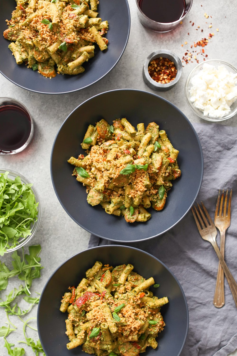Sausage and Sun-Dried Tomato Pasta with Arugula-Goat Cheese Pesto